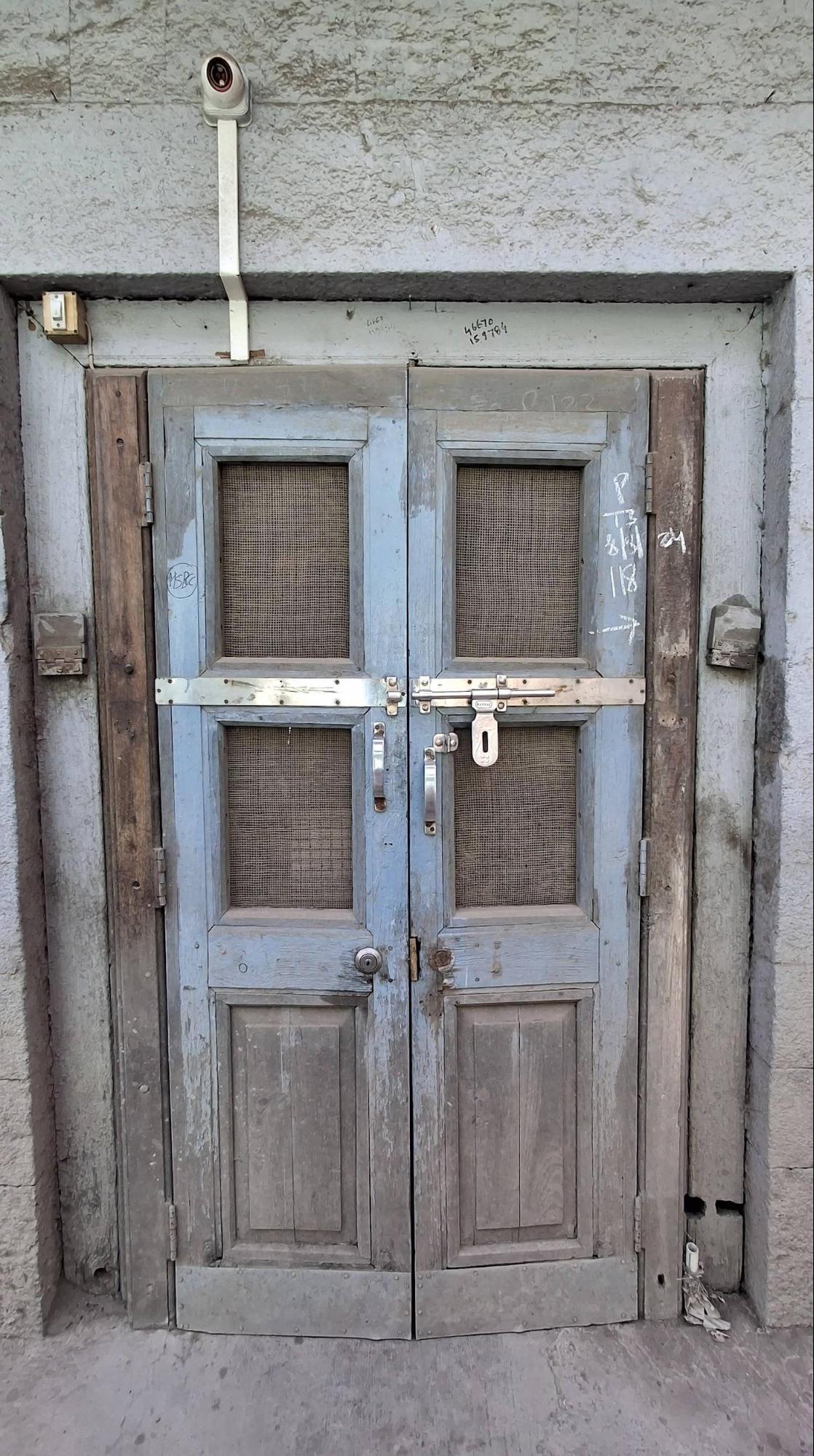 Another door at the entrance has a simple double door structure. (Source: CKA Archives)