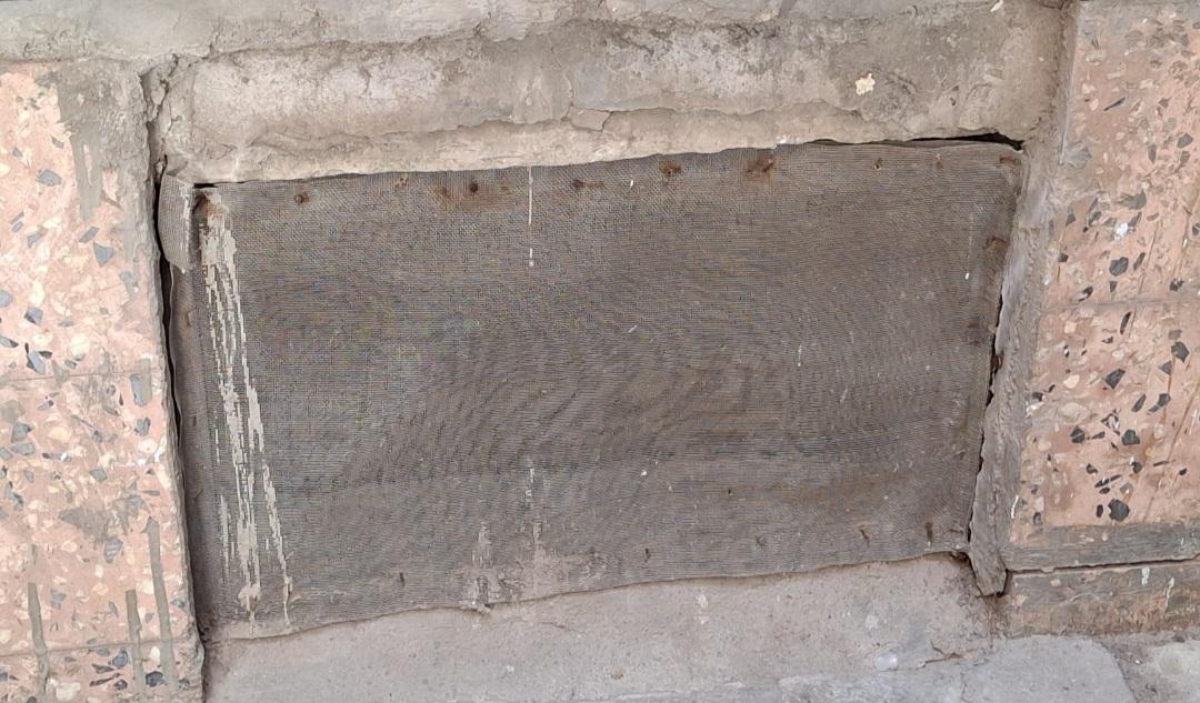 The sealed entrance to the underground tunnel (Balad), a historical security feature found in many homes of this area. (Source: CKA Archives)