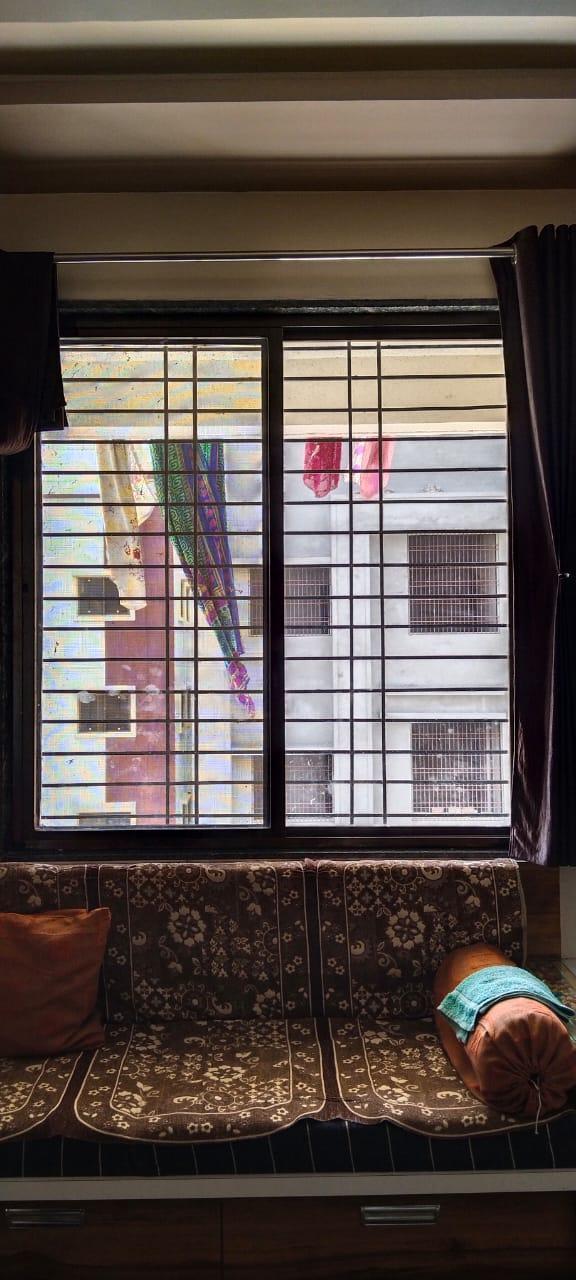 The windows have aluminum frames with glass panels that slide open for ventilation. (Source: CKA Archives)