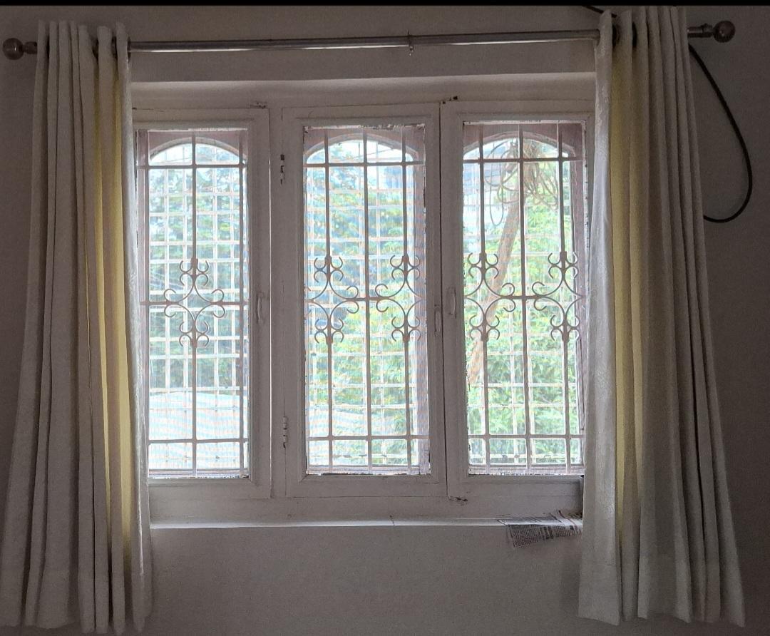 Uniformly designed windows with teak wood frames and fitted with glass panels. (Source: CKA Archives)