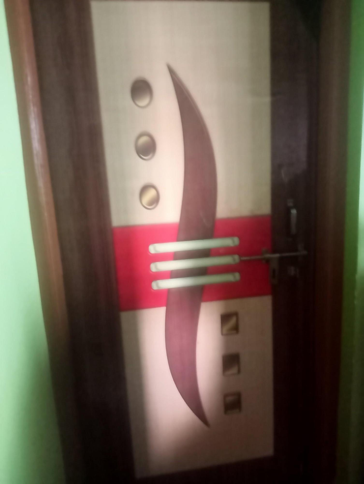 Interior doors made up of plywood, finished with printed laminate. (Source: CKA Archives)