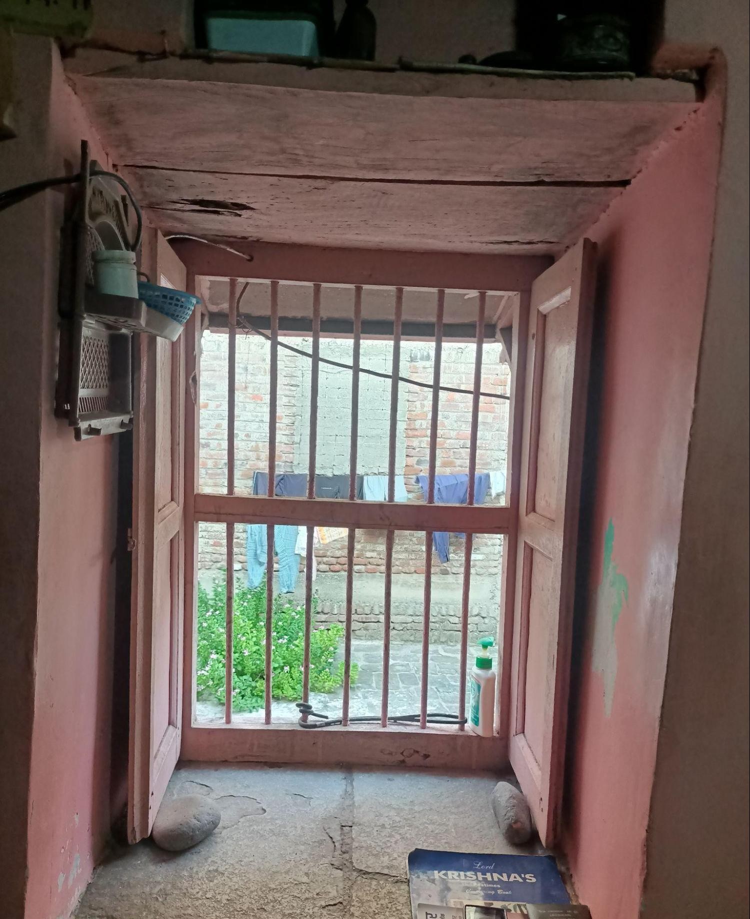 The metal railings, possibly added during renovations, provide both security and a functional design element. (Source: CKA Archives)