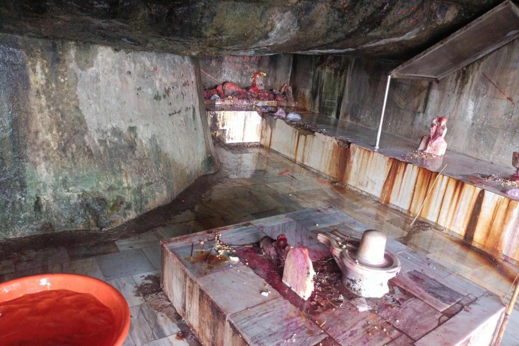The mandir structure nestled under rock formations at Devi Point. (Source: CKA Archives)