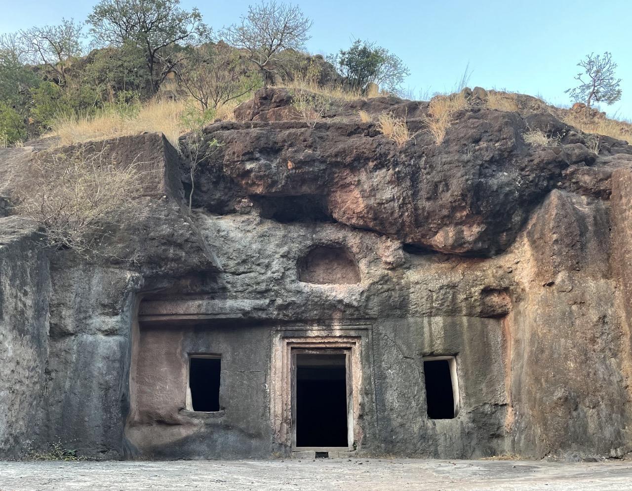 View of the Dharashiv Caves, carved into basalt along a hillside. (Source: CKA Archives)