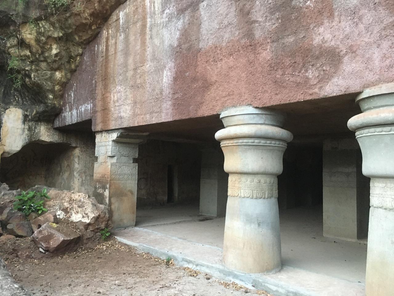 Wide landscape view showing the stepped approach and entrances to the caves. (Source: CKA Archives)