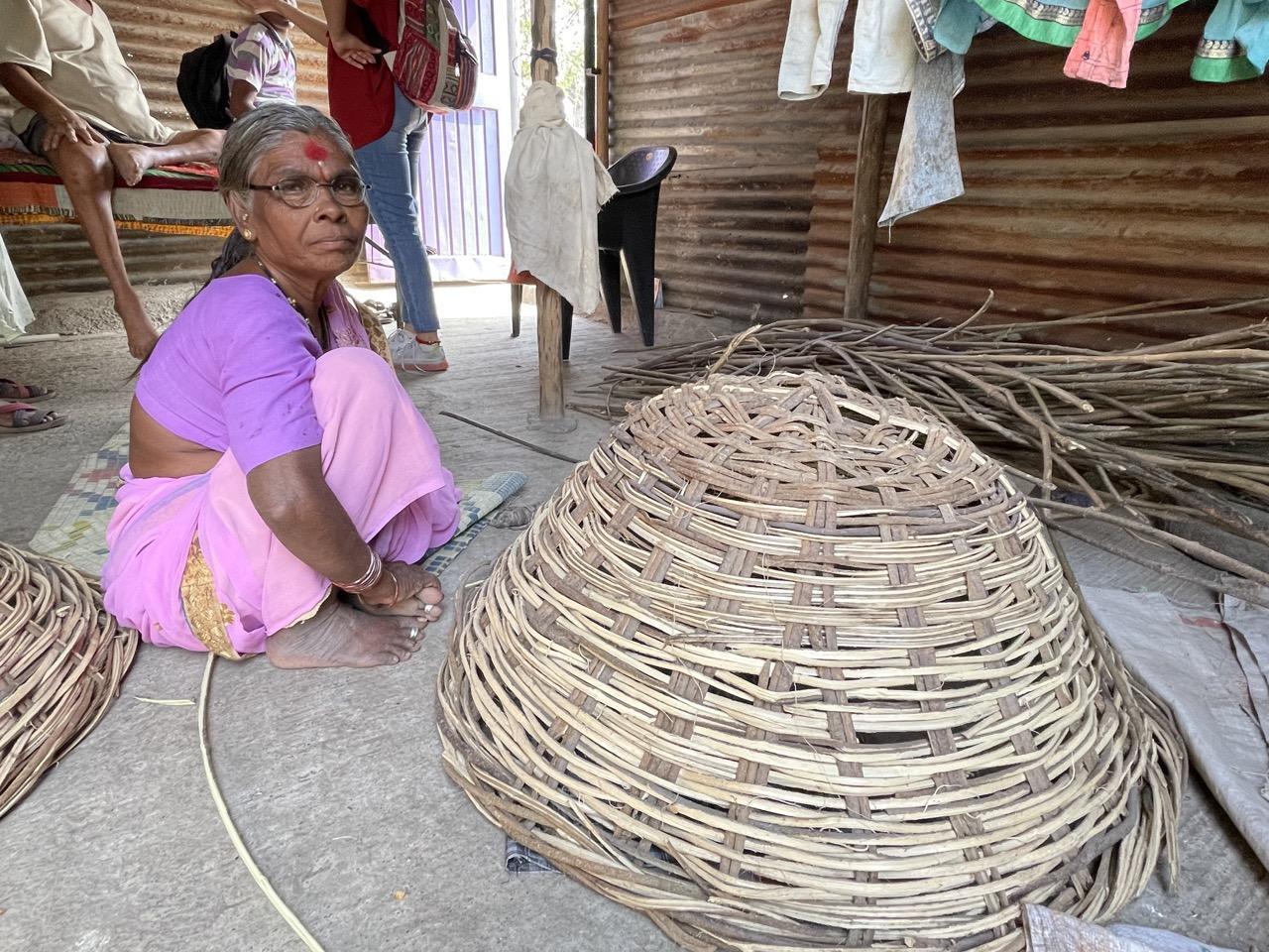 Artisan weaving a zhaap basket at home in Paranda. (Source: CKA Archives)