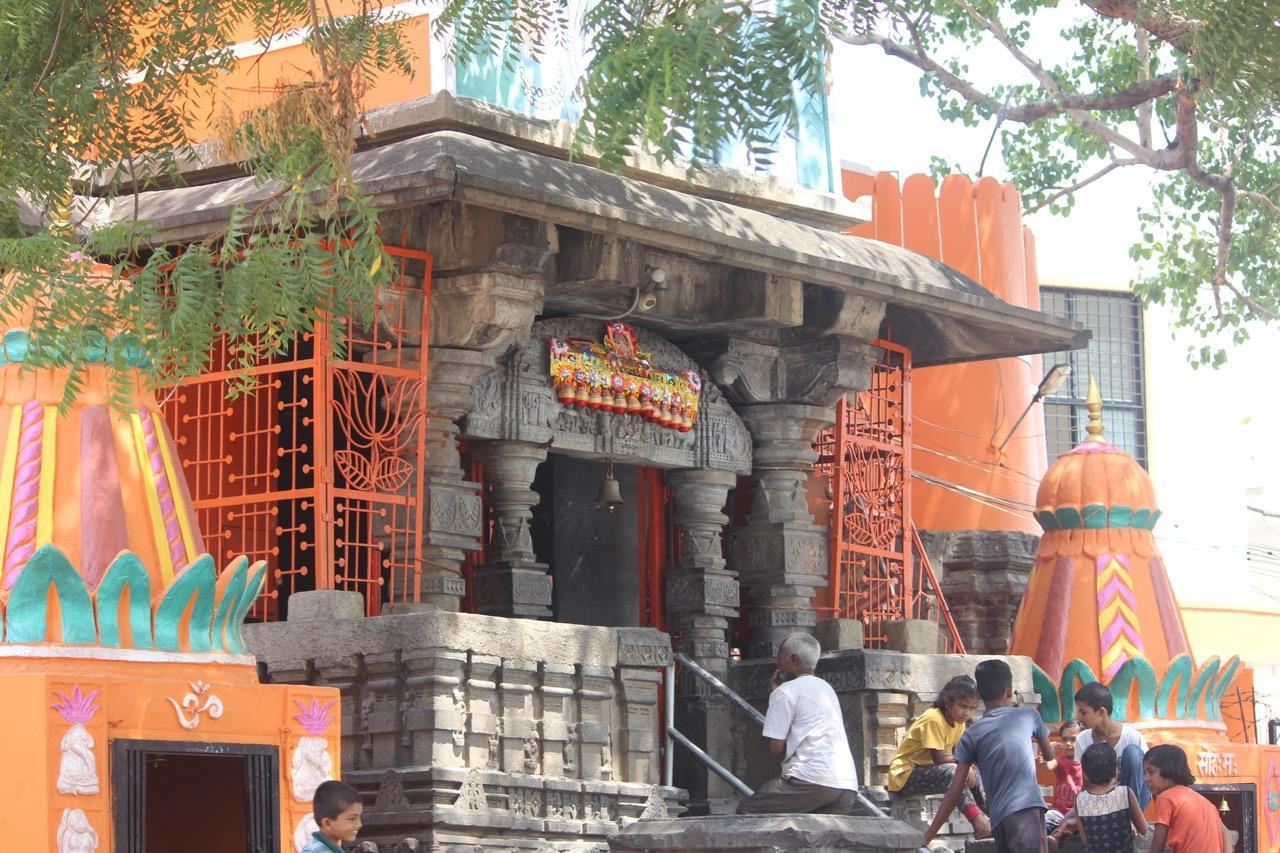 A view of the Shiv Mandir in the morning, with people gathered outside. (Source: CKA Archives)