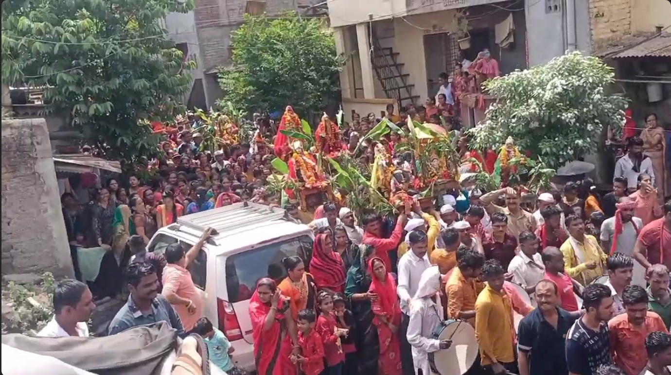 Crowd celebrating Kanbai Festival with music and dance[1]
