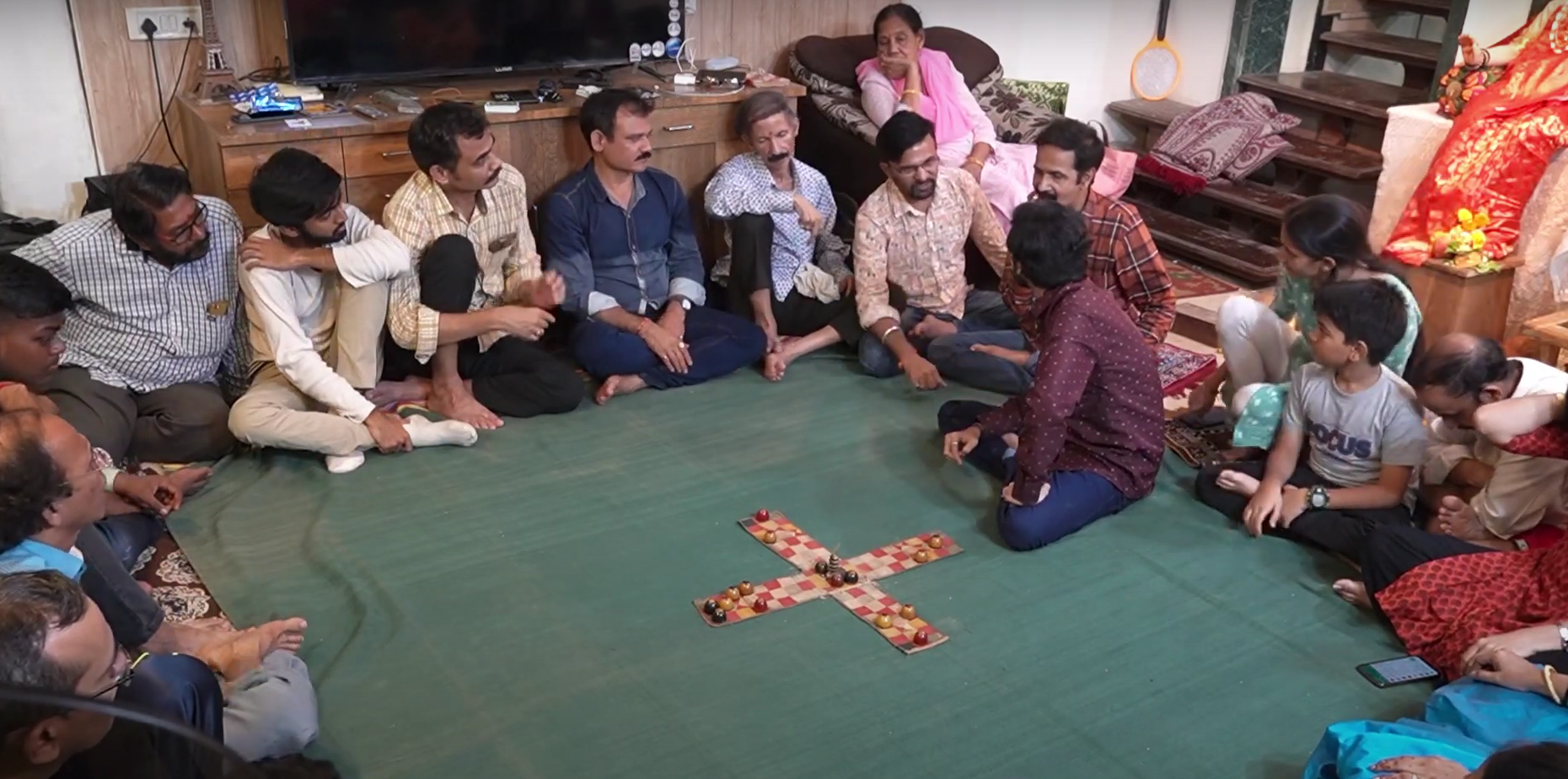 A family enjoying a game of Chausat (Source: CKA Archives)
