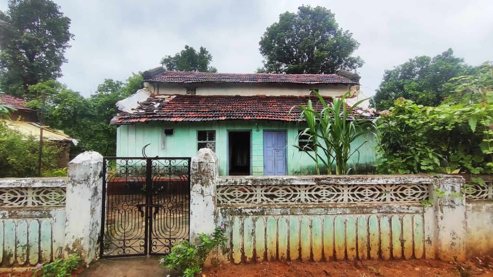 The mint green facade of a house situated in Bhagi Village. (Source: CKA Archives)