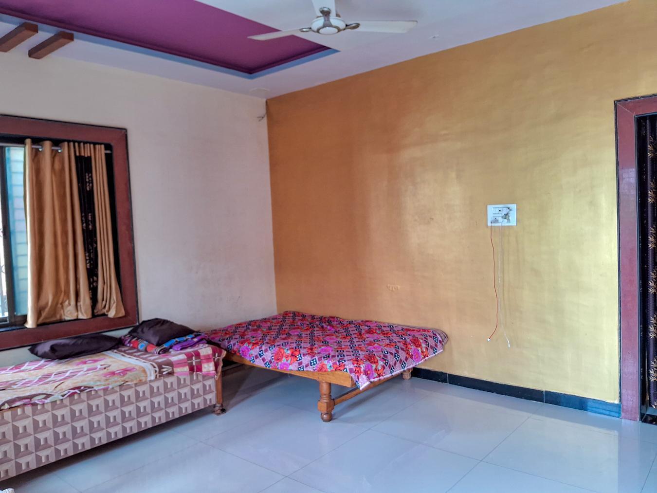 The interior of the house is modern yet simple. It features a gold and purple aesthetic. (Source: CKA Archives)