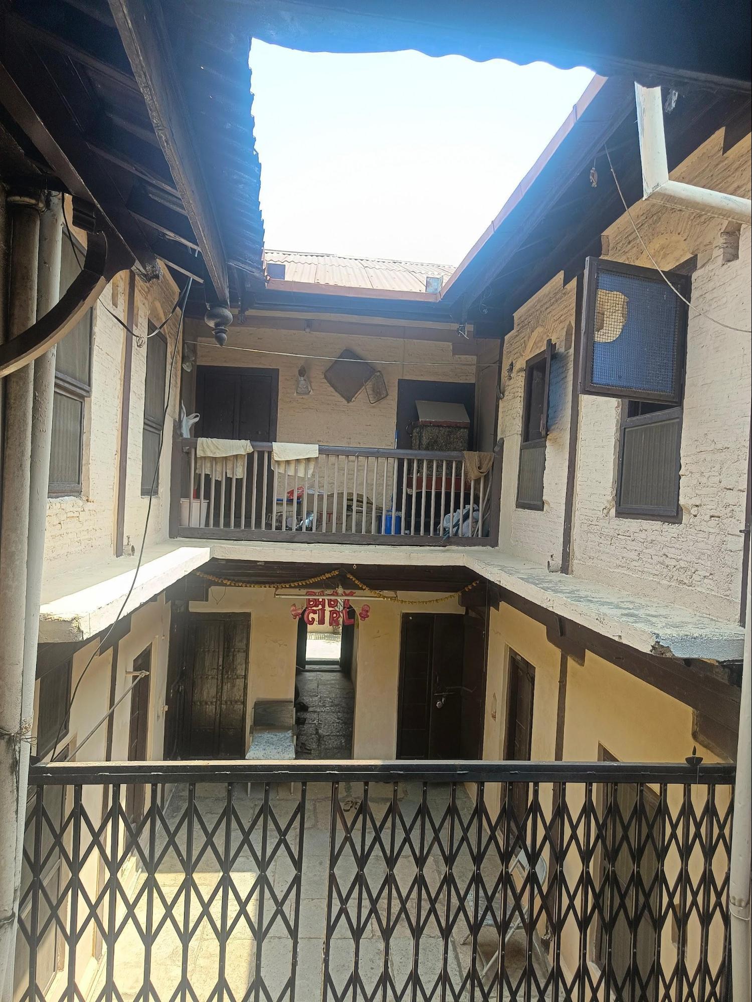The central courtyard of the Bharambe Wada. Notice the way the interior spaces within the residence circle around this area. (Source: CKA Archives)