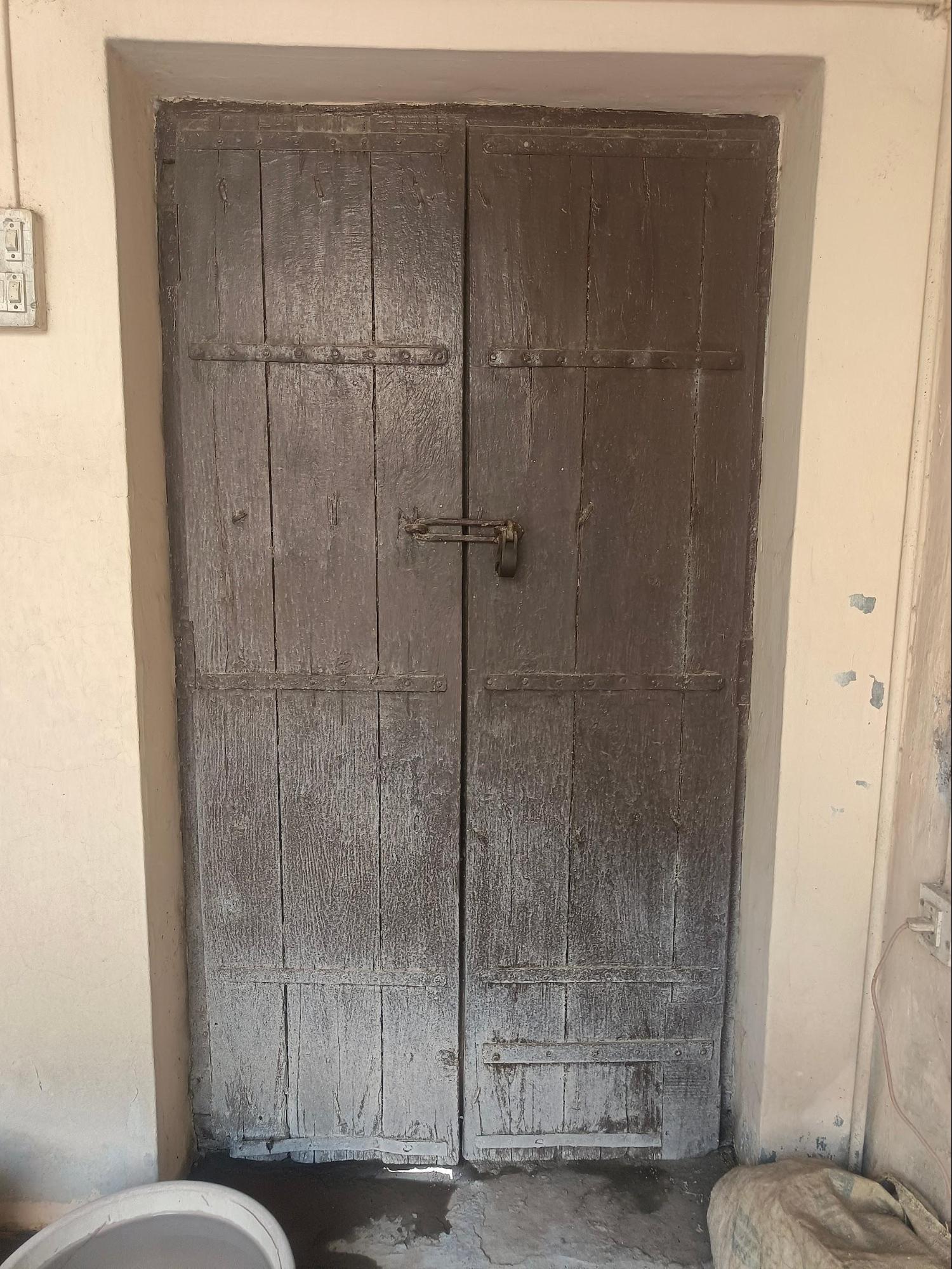 The locking system of these doors typically consists of a chain and padlock. (Source: CKA Archives)