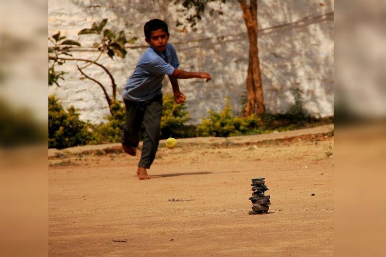 Sat Palani (or Lagori) is a popular outdoor folk game, especially in rural areas. (Source: CKA Archives).