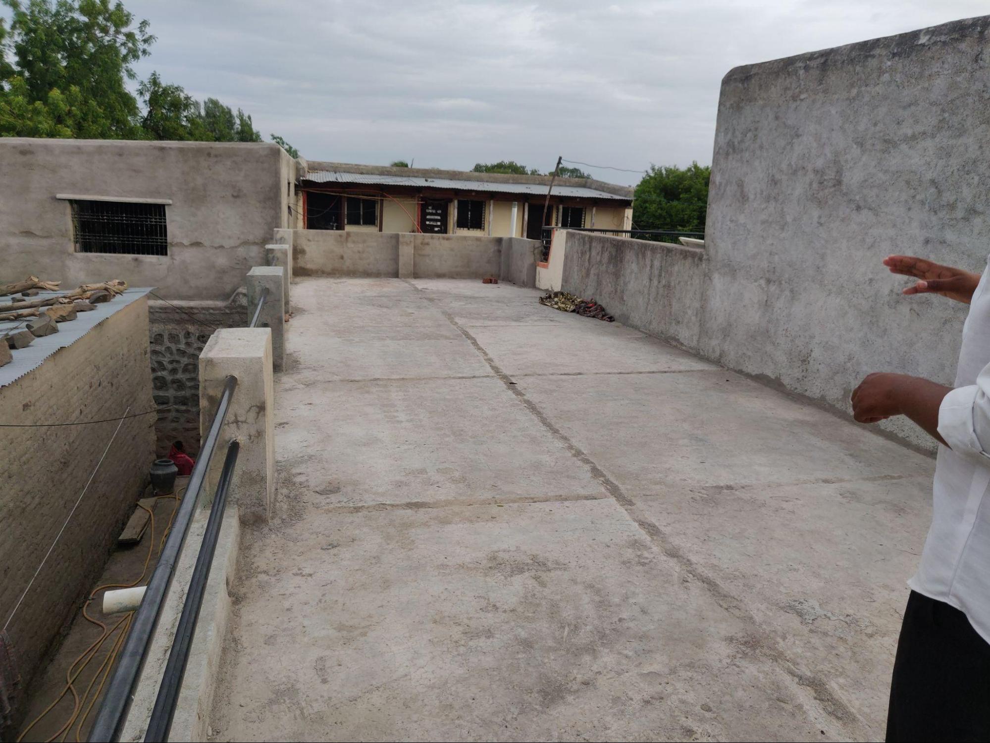 A view of the terrace featuring an unfinished cement surface. (Source: CKA Archives)