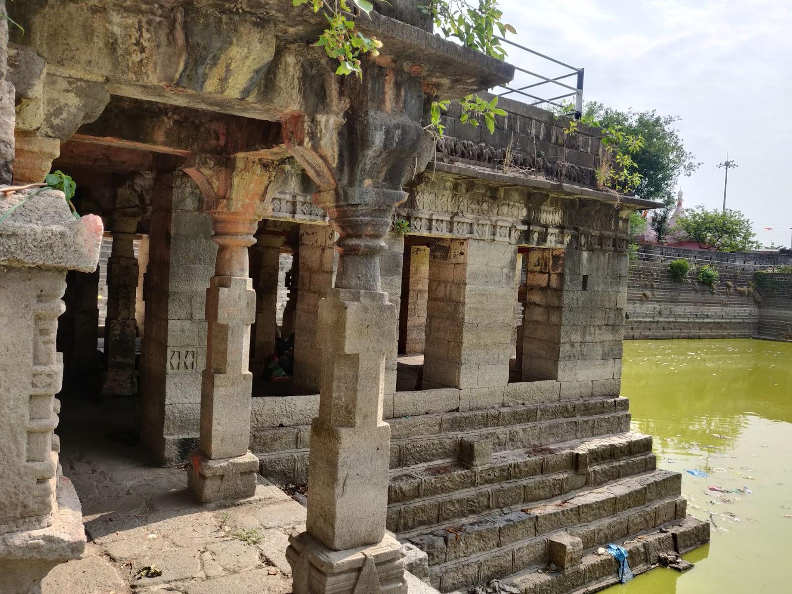 Close view of the stepwell showing stone pillars and other architectural details. (Source: CKA Archives)