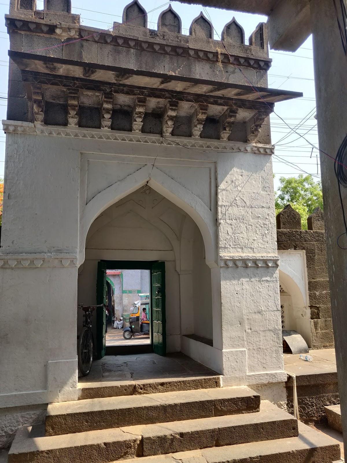 Entrance gate of Kali Masjid, featuring Mughal-style arches. (Source: CKA Archives)