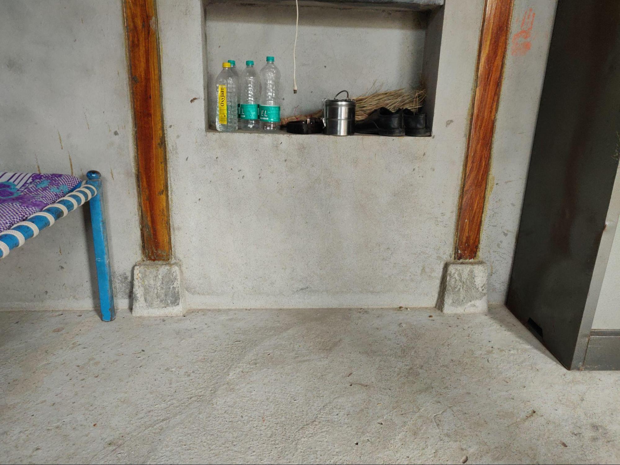 The interior features an exposed wooden framework, continuing the traditional style seen in older Malwad houses. (Source: CKA Archives)