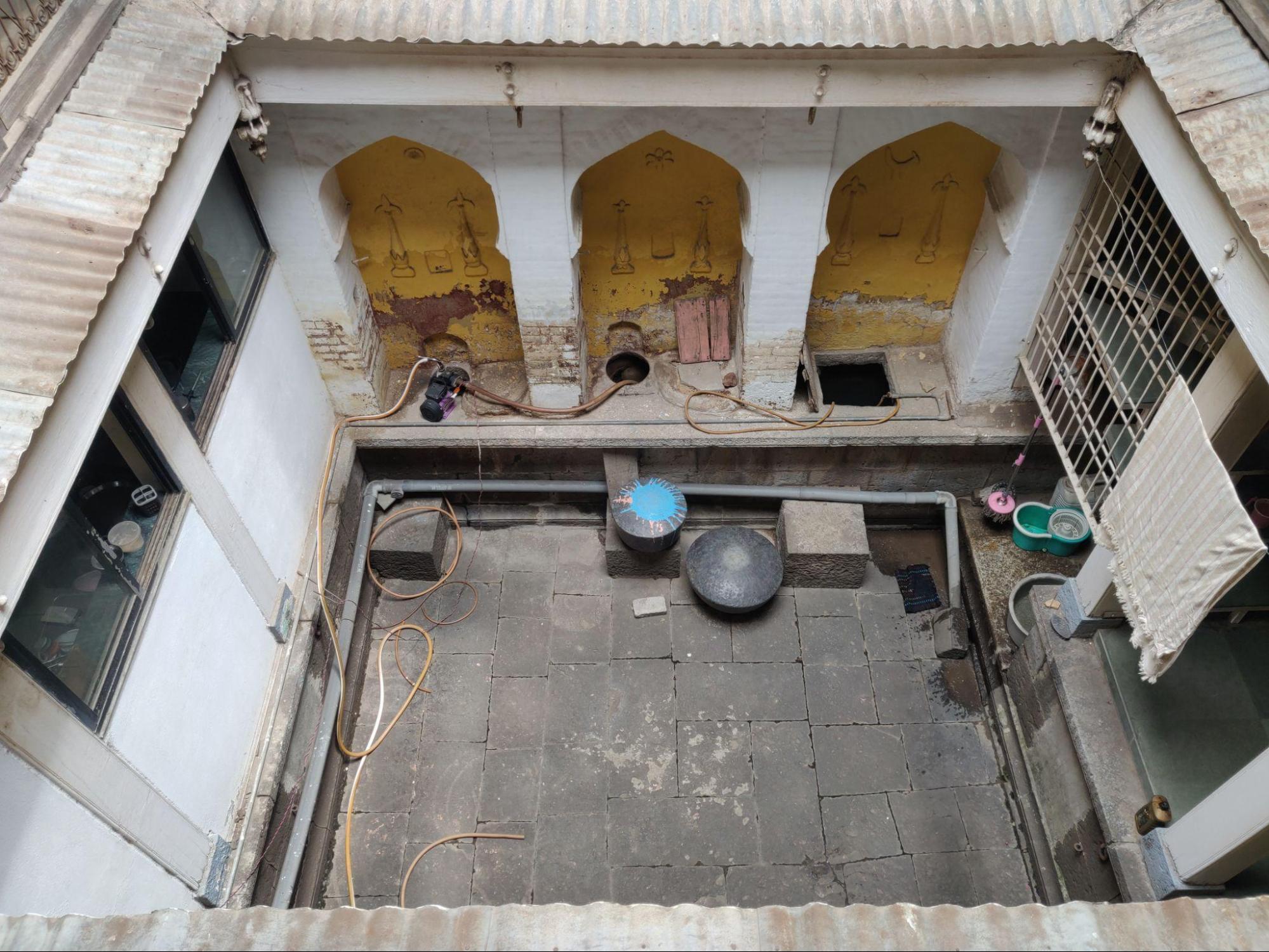The stone flooring of the courtyard showcases traditional paving patterns that have endured for centuries. (Source: CKA Archives)