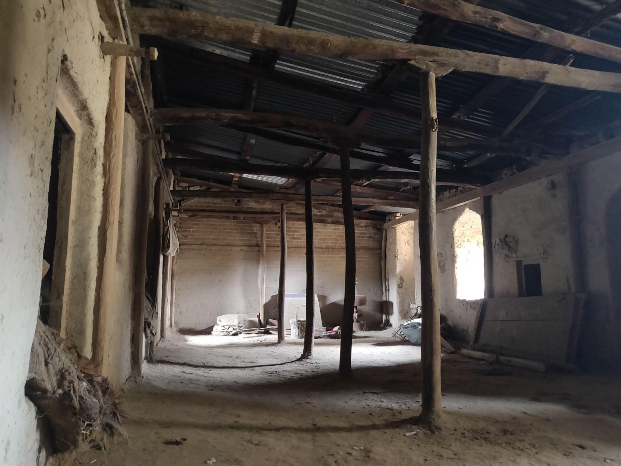 The third floor shows significant deterioration, with structural elements exposed to the elements. (Source: CKA Archives)