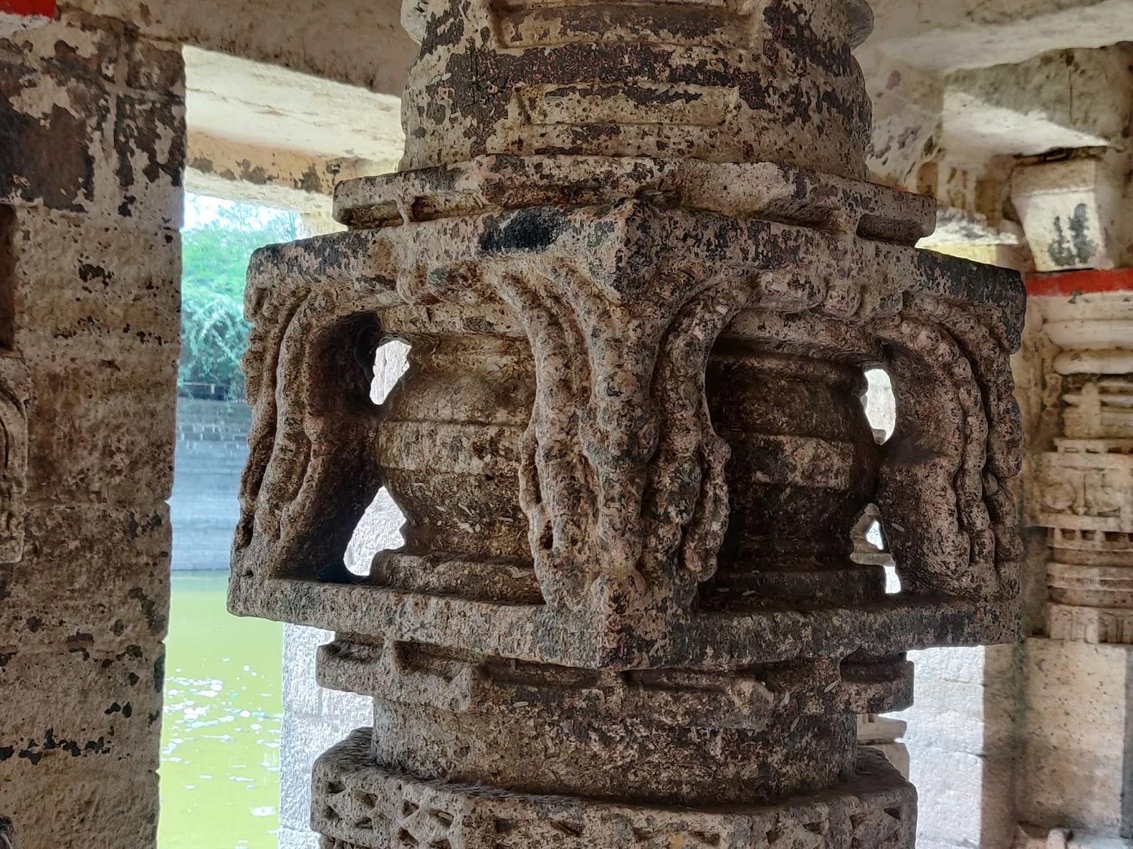Notice the Intricate carvings on the Stambhs of the Mandir (Source: CKA Archives)