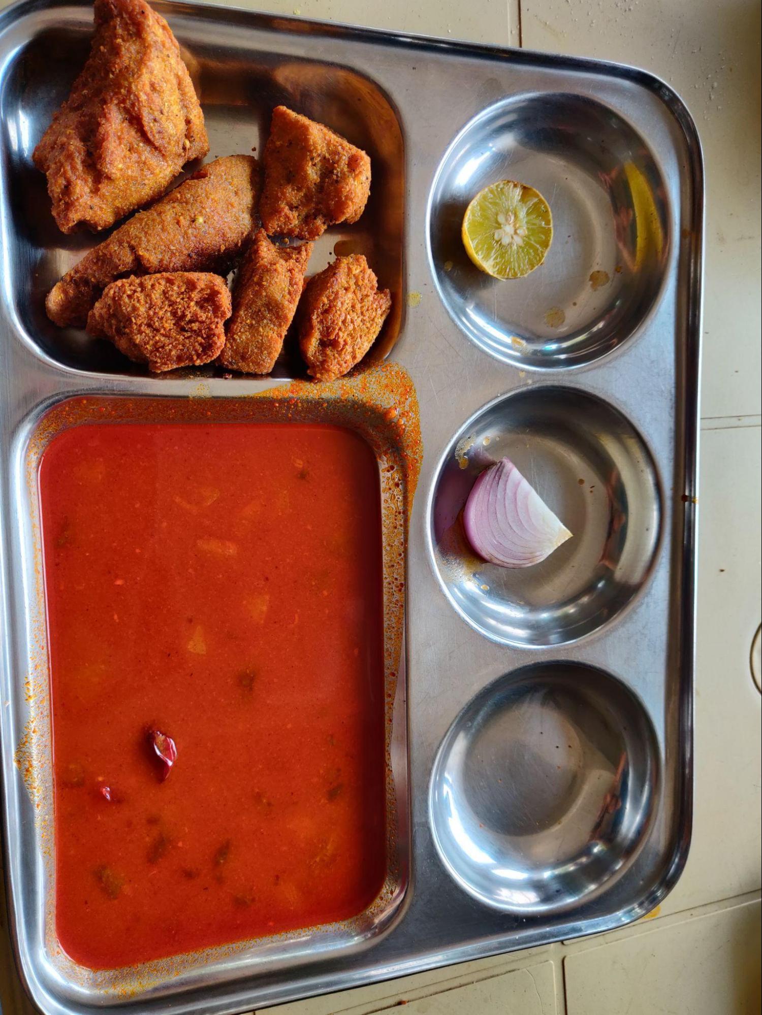 This dish originated in Rajasthan and, due to migration, it has become popular in the Khandesh and Marathwada regions. In Rajasthan, dal bati is circular in shape, but in Jalna, it is toast-like and rectangular. Additionally, the dal in Jalna is spicier than in Rajasthan. First, they mix soybean and wheat flour to make the bhatti, then they boil it. When serving, they deep fry it in oil, resulting in a dish that is crunchier on the outside and softer on the inside  (Source: CKA Archives).