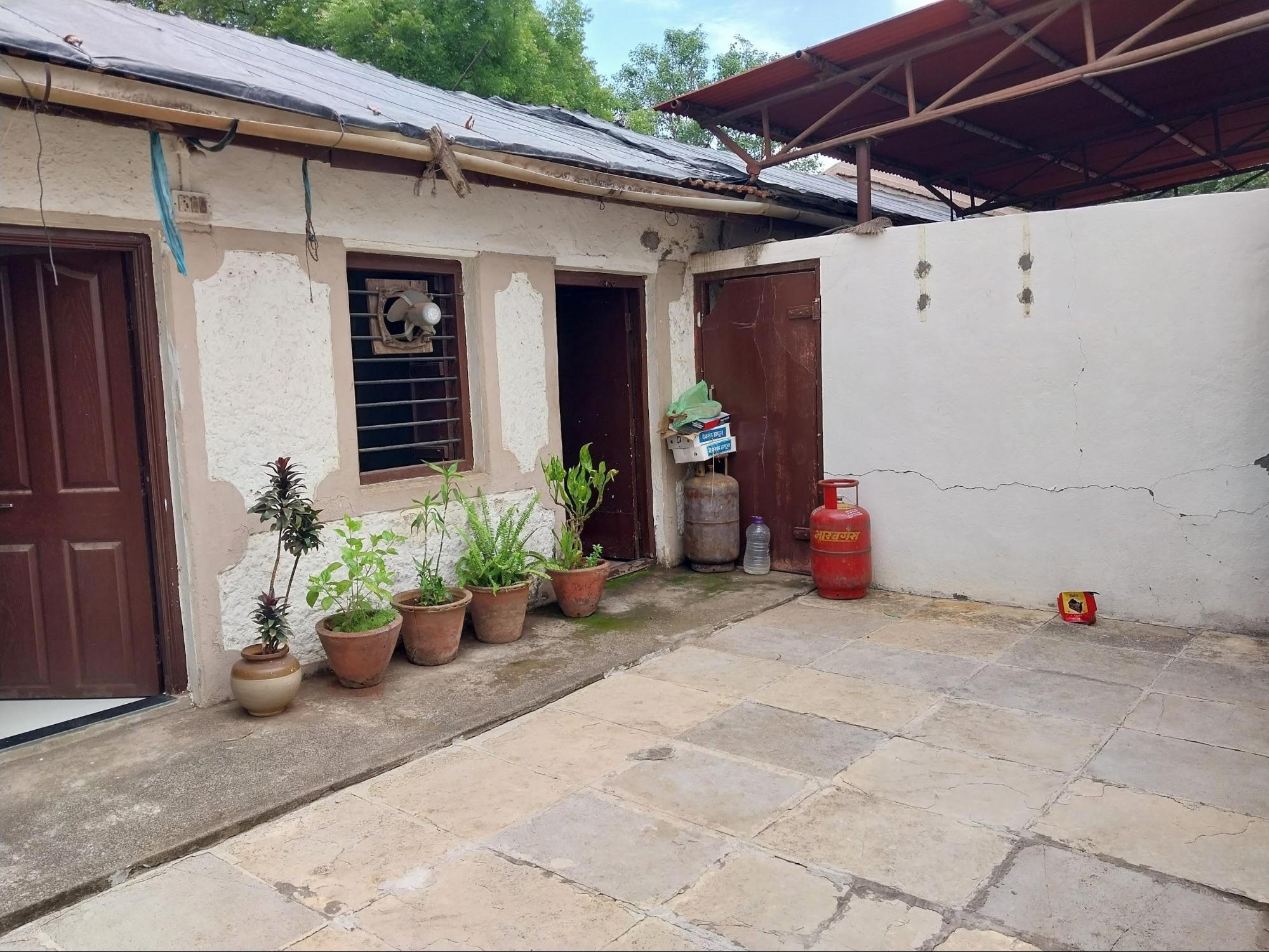 The multipurpose backyard behind the kitchen includes two storerooms, providing practical storage space for household items. Its Shahabadi tile flooring, distinct from the pavement tiles used elsewhere, may be an original architectural feature—one that is becoming increasingly rare in contemporary design. (Source: CKA Archives)
