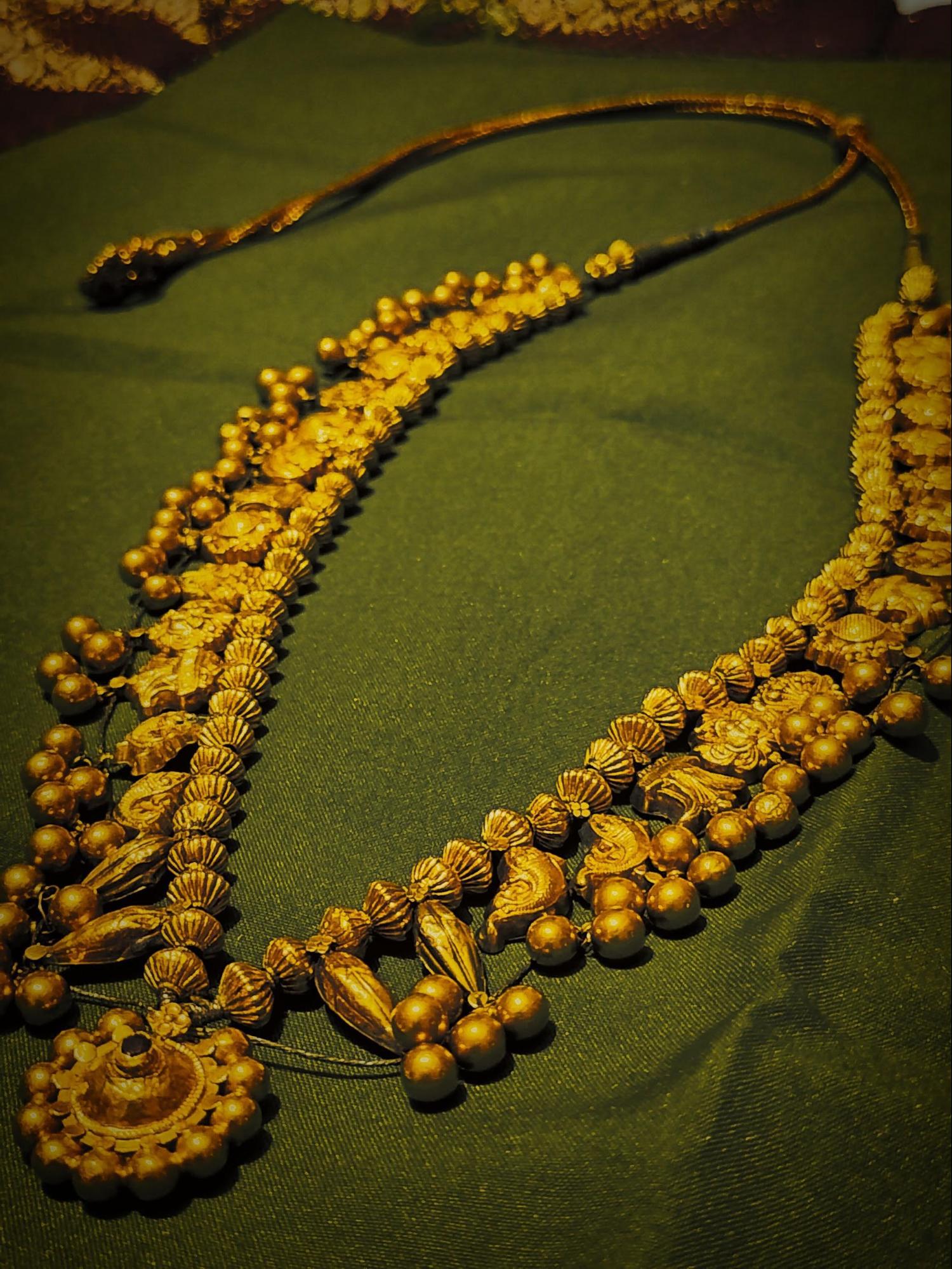 Notice the symbolic designs such as the fish and conch feature on a Saaj. They are often associated with prosperity and spiritual protection. Source: CKA Archives