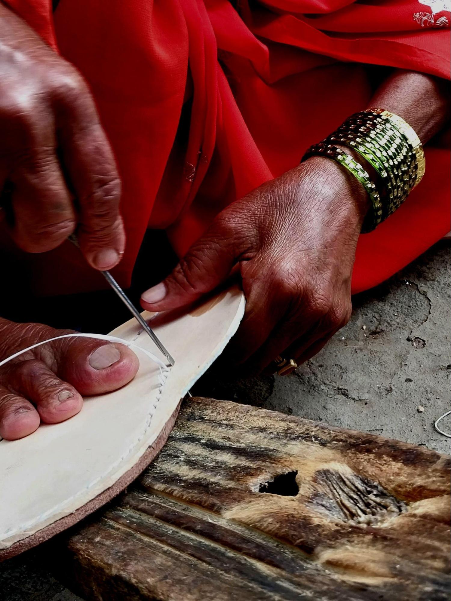 The two sole layers are hand-stitched to secure the structure and enhance durability. Source: CKA Archives