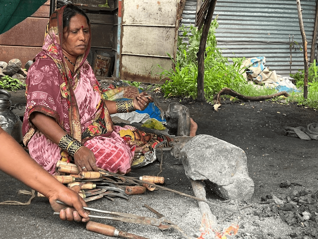 A craftsman can often be seen forging bars of metal into sickles and other essential tools, showcasing their skilled craftsmanship in Ganj Golai Market of Latur. (Source: CKA Archives)