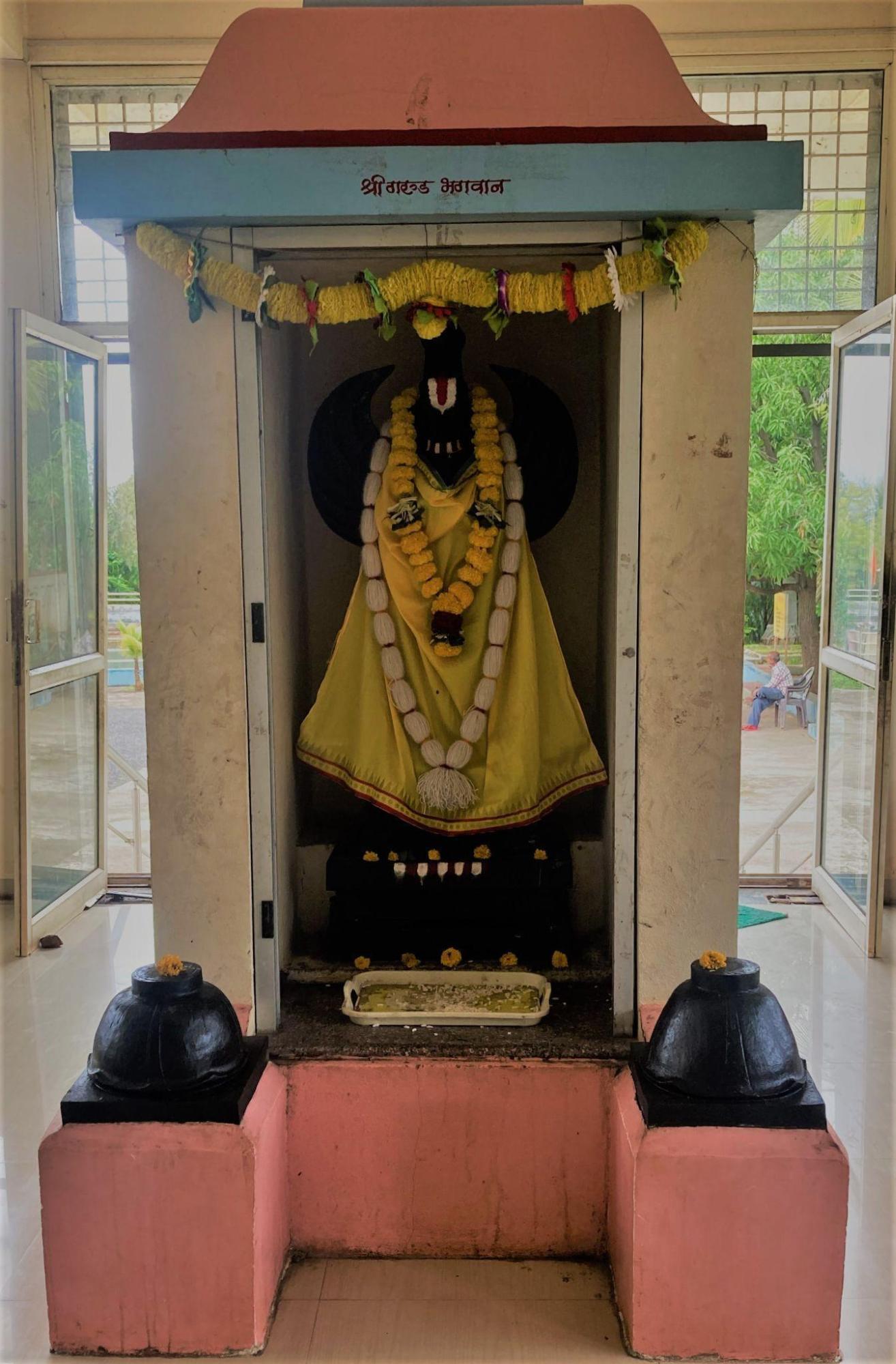 A smaller shrine toGarud, the divine companion of Balaji, is positioned facing the main sanctum, in accordance with customary practice. (Source: CKA Archives)