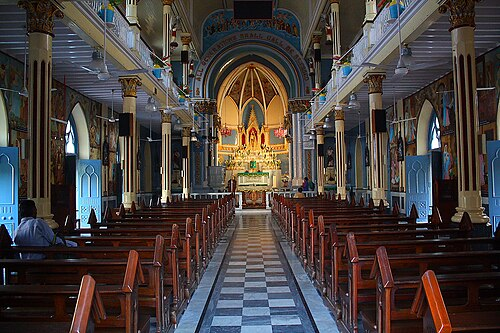 At Mount Mary Church, a central nave and cruciform plan lead to the statue of the Virgin Mary.[7]
