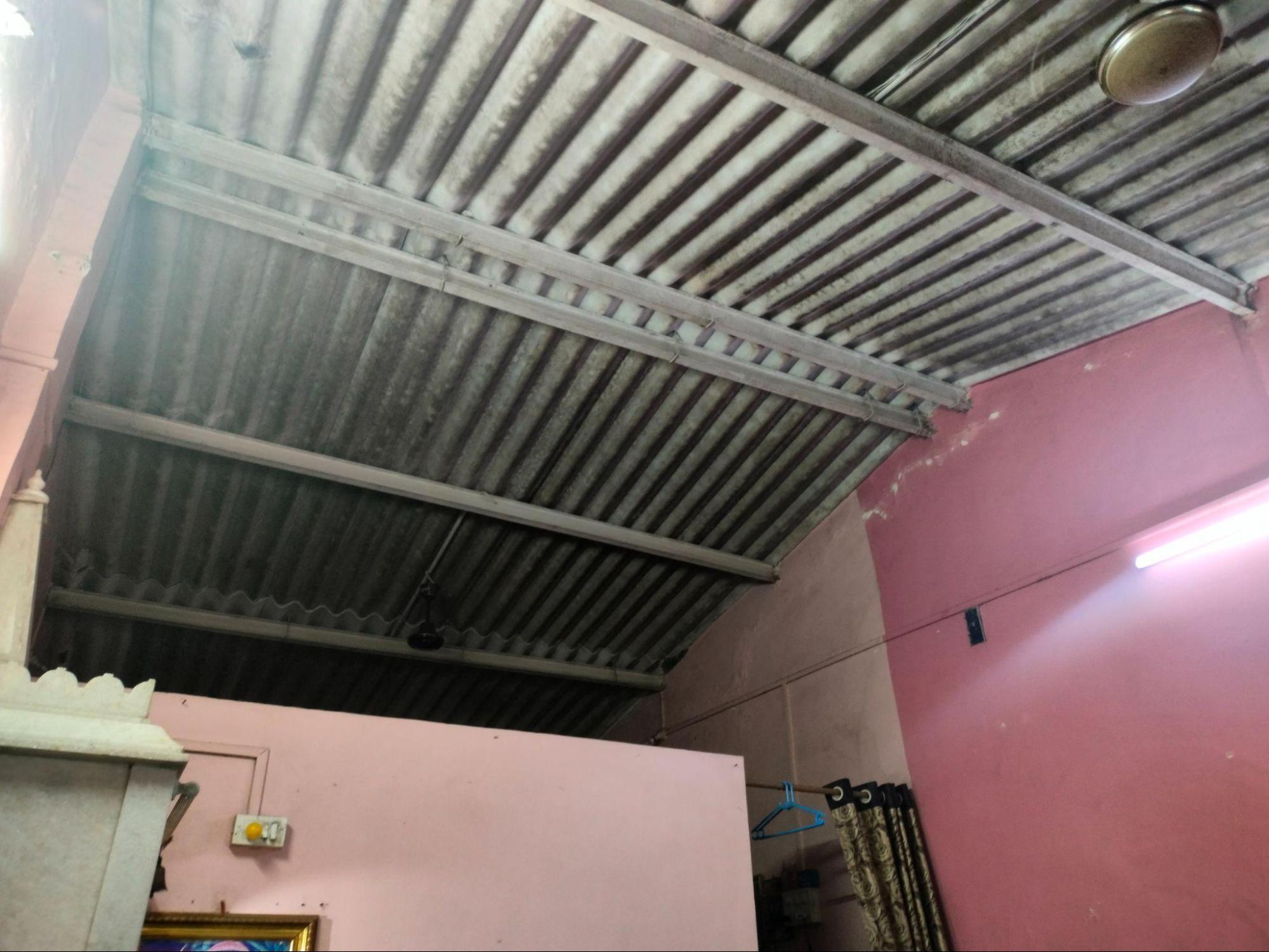 Exposed beams supporting corrugated metal sheets, roofs had no false ceilings, keeping interiors open and ventilated. (Source: CKA Archives)