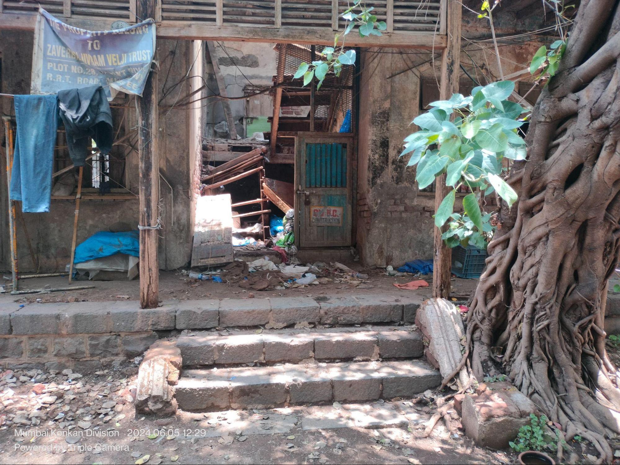 The plinth and entrance flooring are constructed from cut stone blocks, forming the structural base of the building. (Source: CKA Archives)