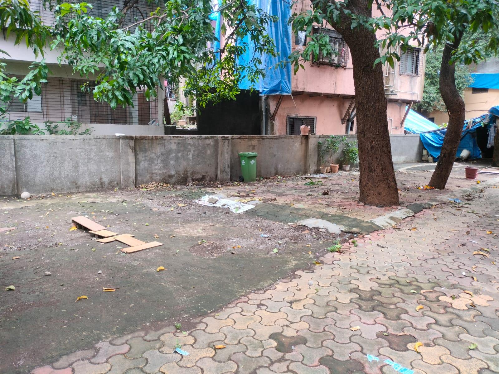 Trees planted by residents now line the compound’s edges in the absence of a formal garden.(Source: CKA Archives)