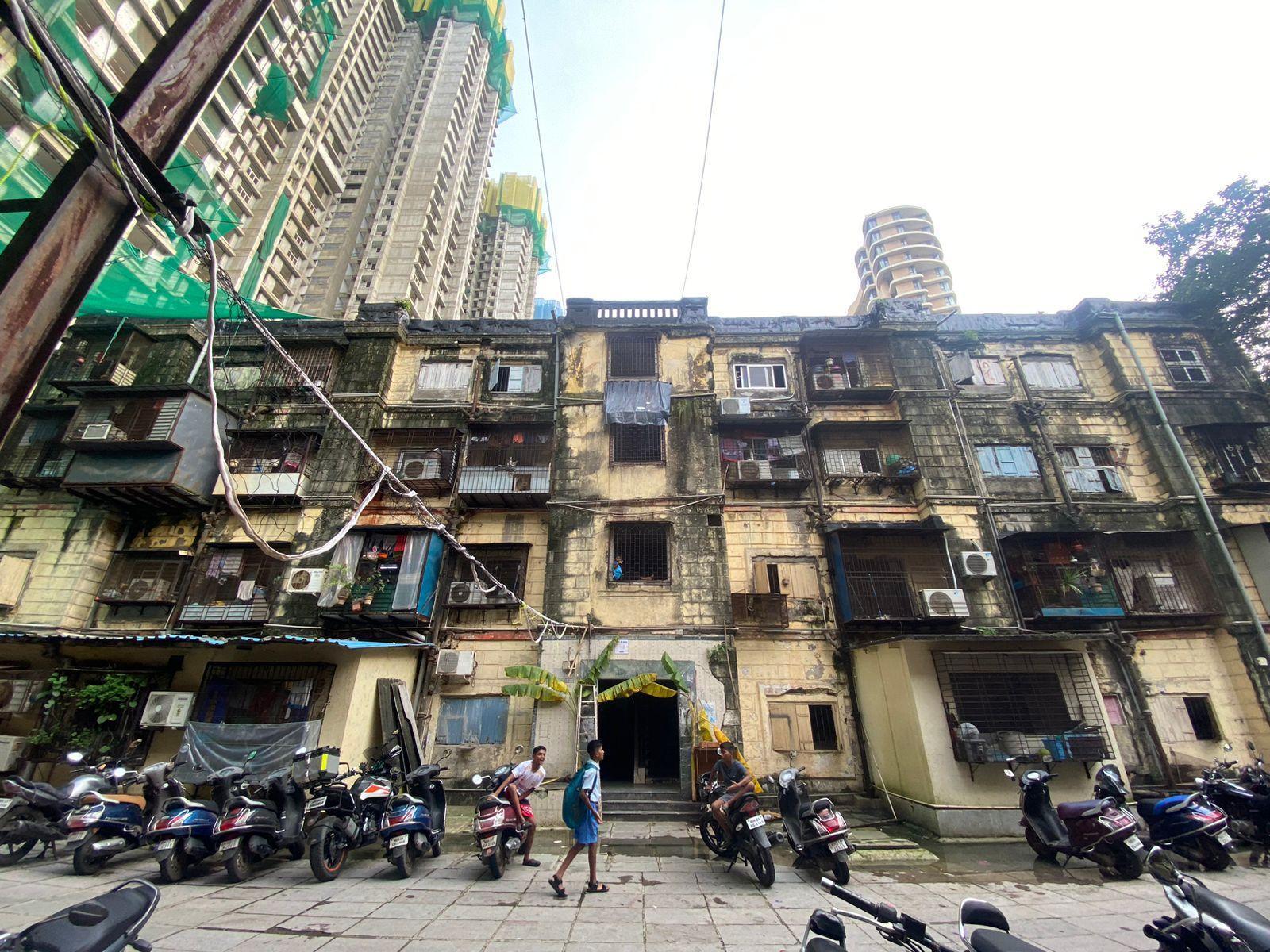 BDD Chawls in comparison to high-rise, contemporary development in the area. Source: CKA Archives