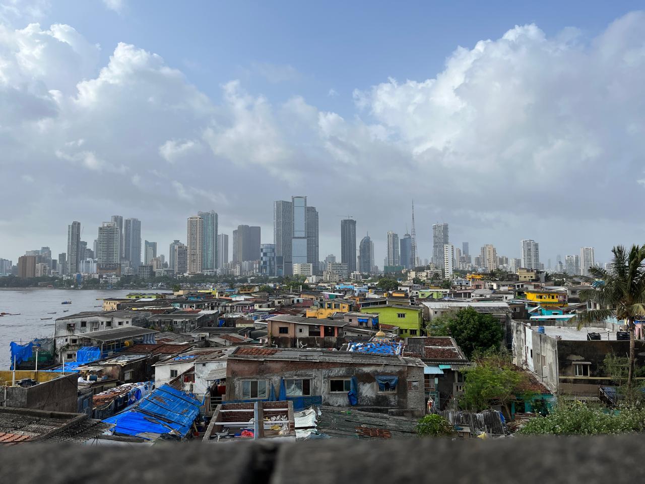 Low-rise settlements, in contrast to contemporary towering skyscrapers, reflecting the city’s urban landscape. Source: CKA Archives