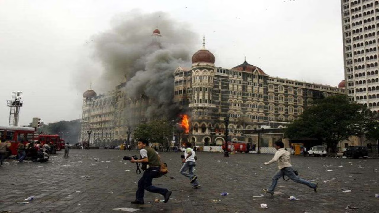The Taj Mahal Palace in flames during the 2008 Mumbai attacks.