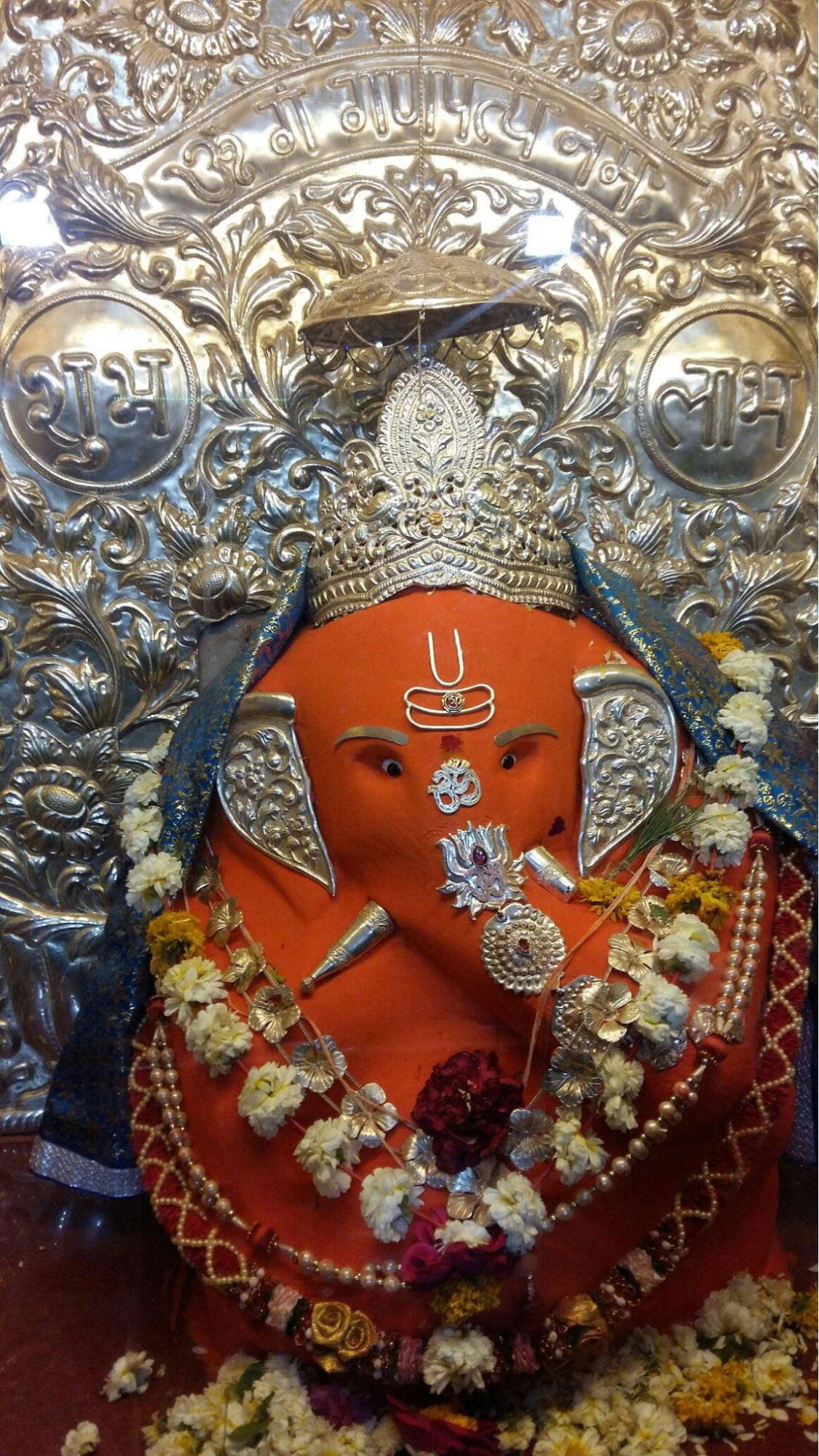Bhagwaan Ganesh of the Dandpaneshwar Ganesh Mandir, Devmogra, Nandurbar.[3]
