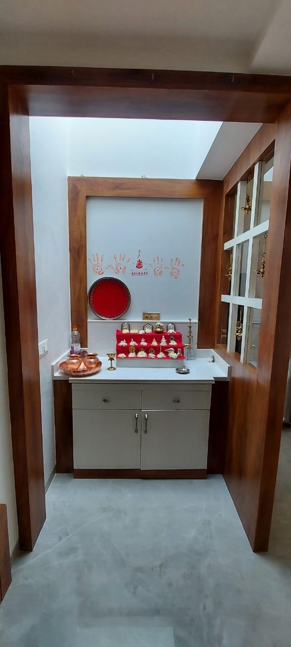 Interior doorway with wooden framing. Notably, one can see how the wooden details of this house are quite different from the traditional houses that were built in the past. (Source: CKA Archives)
