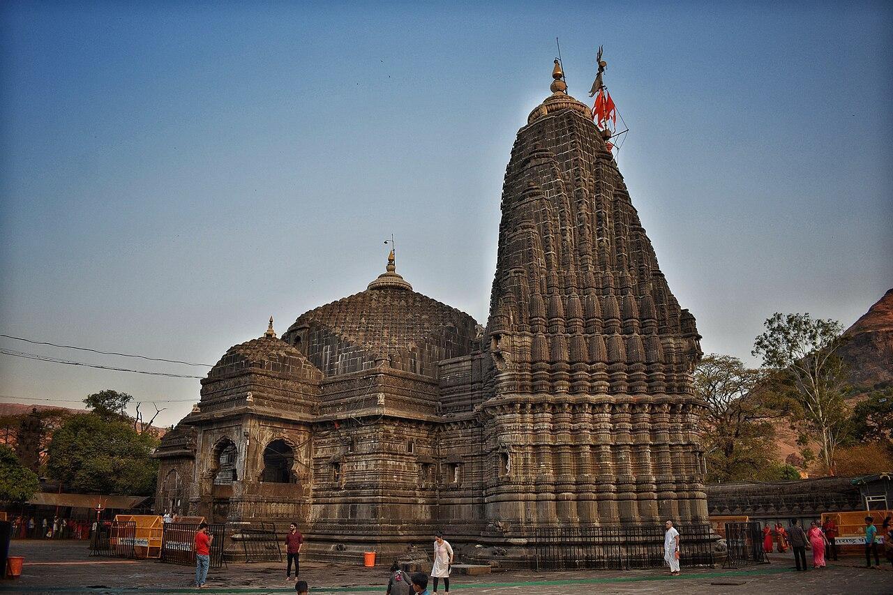 Trimbakeshwar Shiv Mandir, built in local black basalt stone, follows the Nagara style with Hemadpanthi influences.[5]