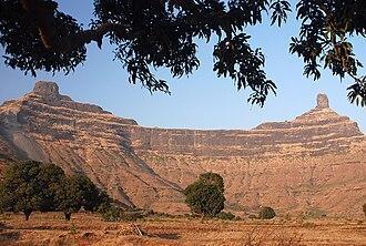 Mangi Tungi hills, Tahrabad (Nashik district) is a Jain yatra site featuring ancient mandirs and rock-cut carvings of Tirthankaras.[8]