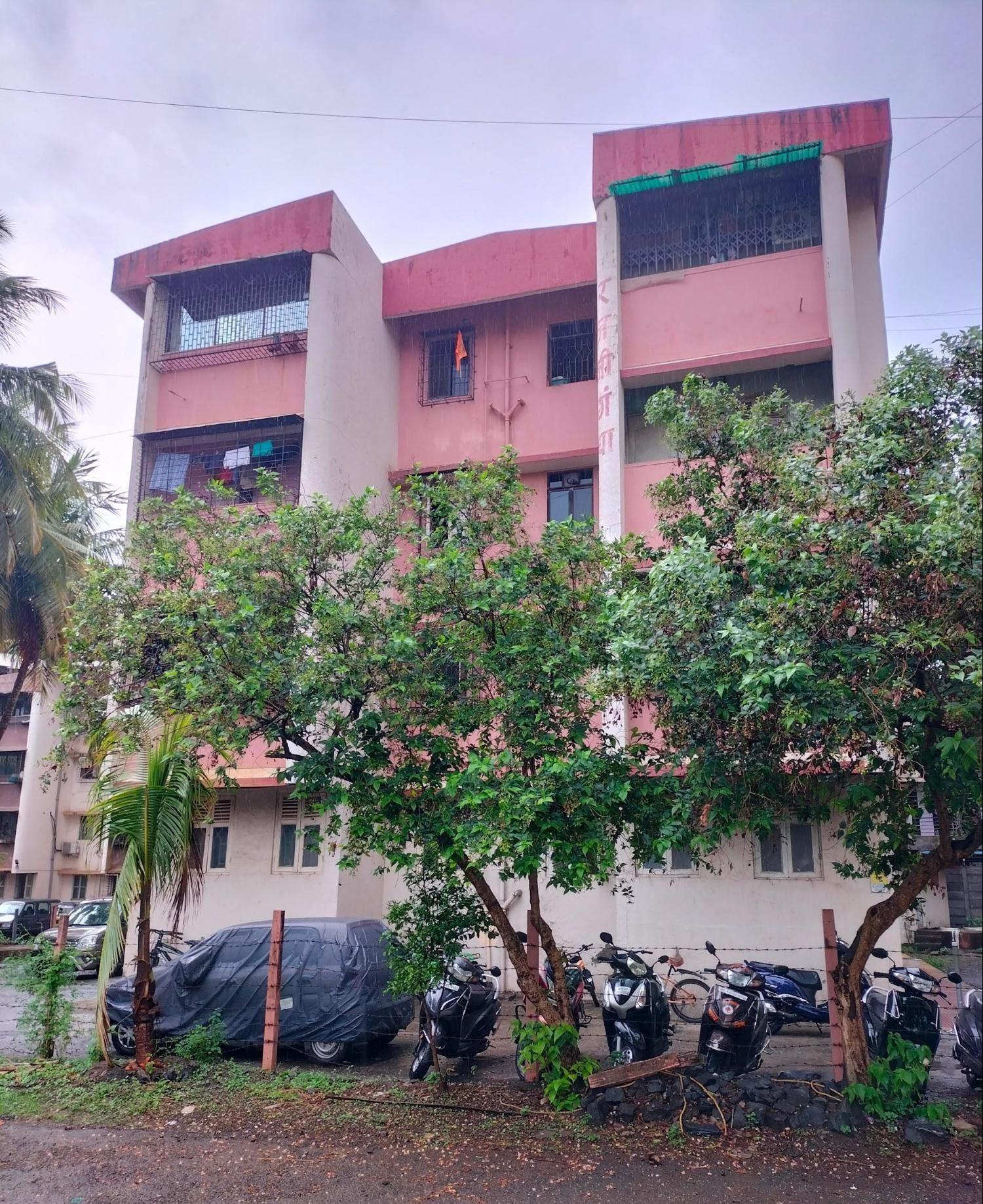 Front view of the three-storey building with parking space in the foreground. The structure reflects typical residential construction from the 1980s.(Source: CKA Archives)