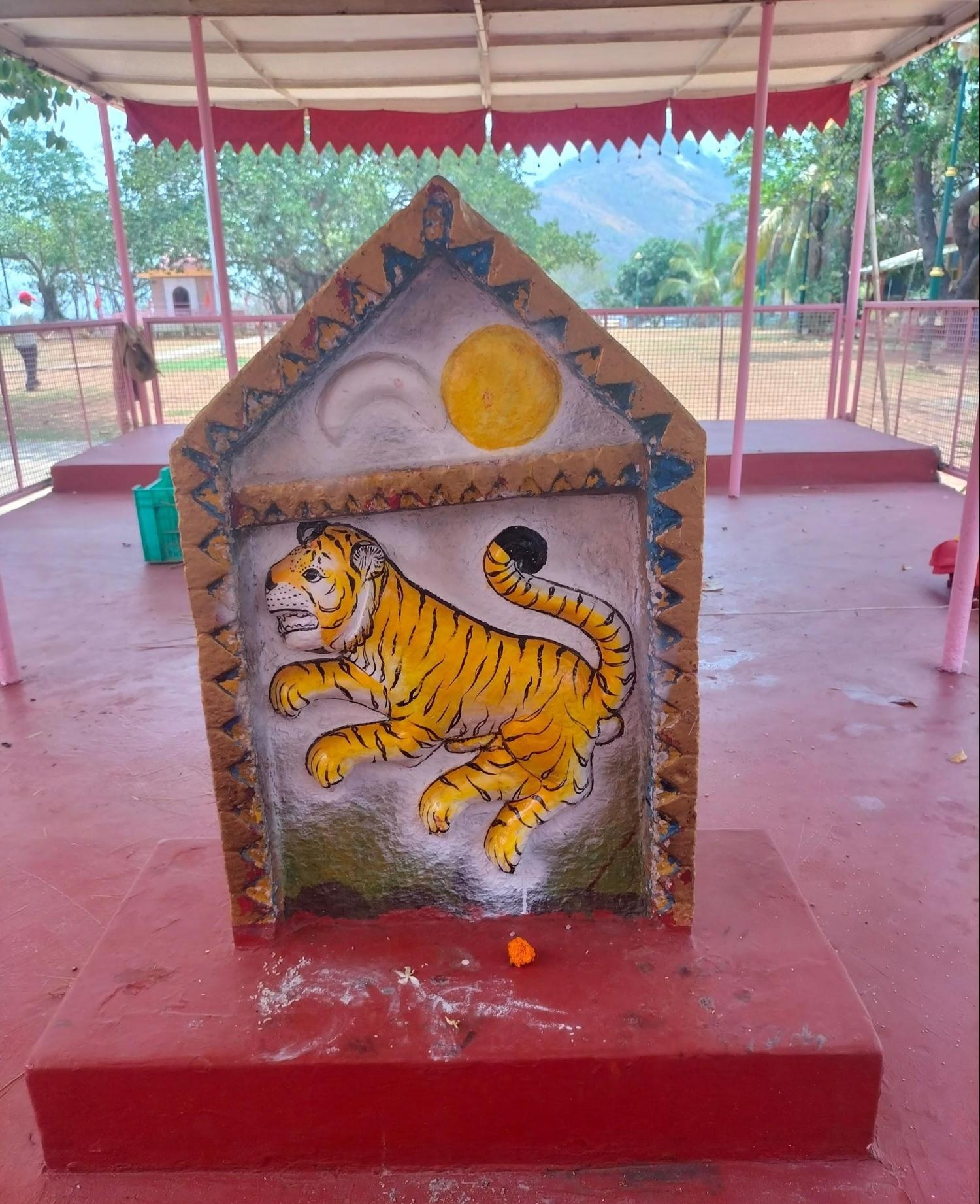 The figure, believed to represent Waghoba (the guardian deity of the Warli community) is carved with sun and moon motifs. (Source: CKA Archives)