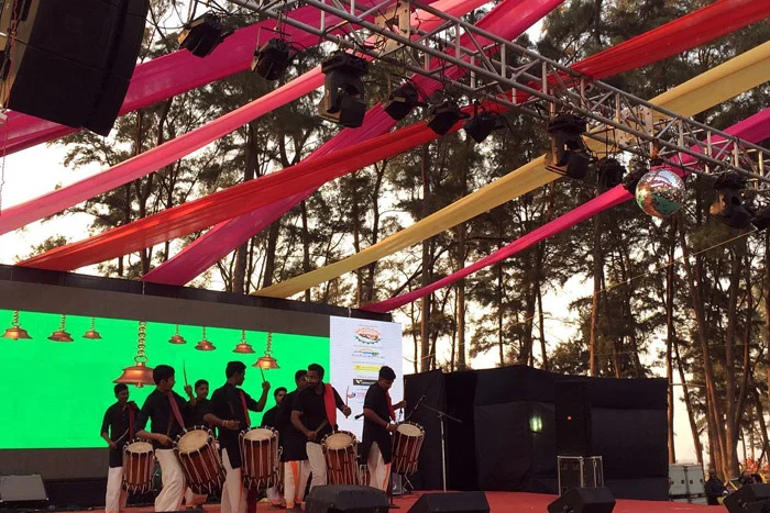 Live music performance at the Chikoo Festival, featuring regional artists and celebrating local talent.[3]