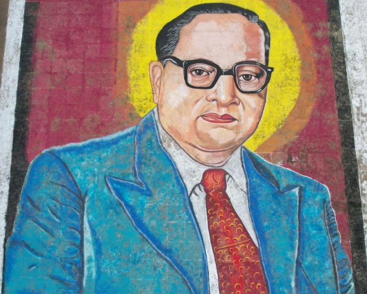 Students working on a large-scale rangoli depicting Dr. B.R. Ambedkar, created for his 132nd birth anniversary in Parbhani, 2023.[1]