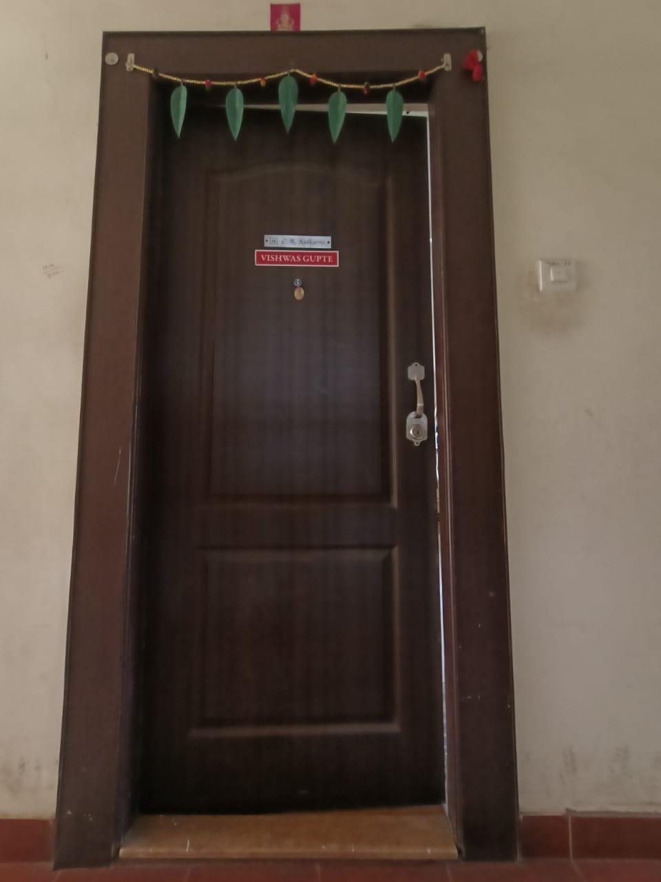 A recessed, polished wood door fitted with steel attachment. (Source: CKA Archives)