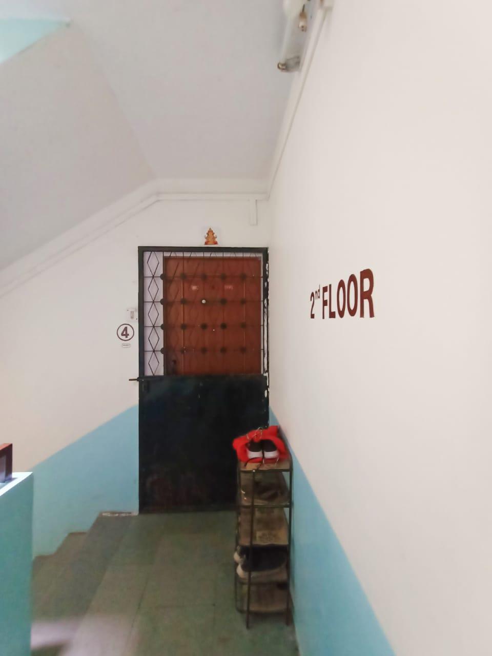 Main entrance with a metal outer door and wooden inner door. (Source: CKA Archives)