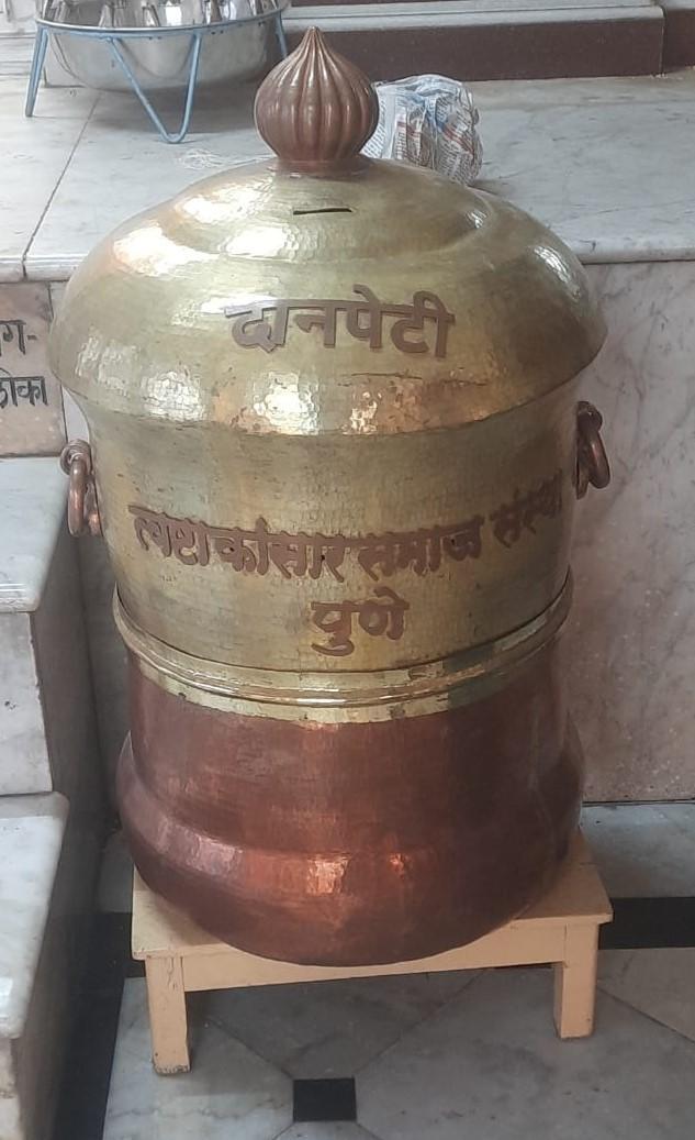 Brass daankoti (donation box) placed inside the Kalika Devi Mandir, made by community artisans. (Source: CKA Archives)