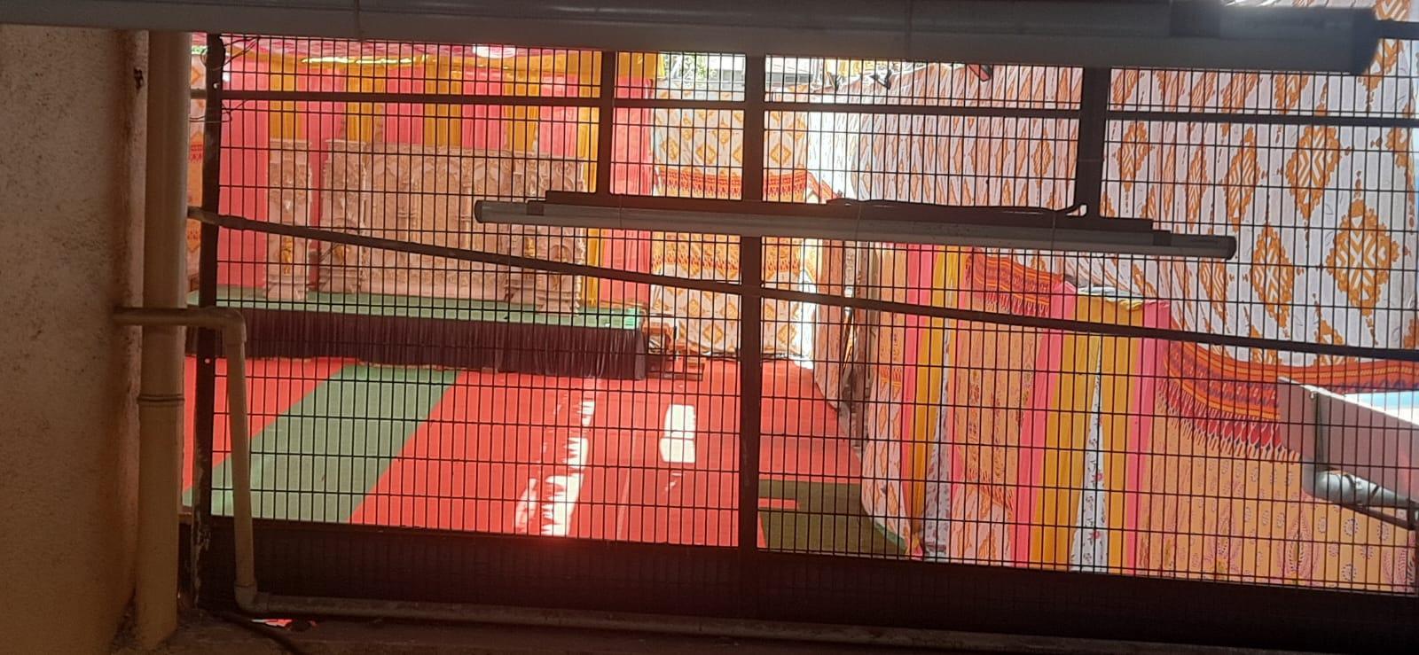 The temporary mandap erected during Ganesh Chaturthi, built annually behind Kalika Devi Mandir and used as a site for craft display and collective worship. (Source: CKA Archives)